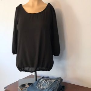 Black blouse w red bow in back